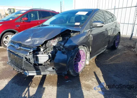 2014 Ford Focus Titanium from USA, damaged, VIN 1FADP3N24EL192799